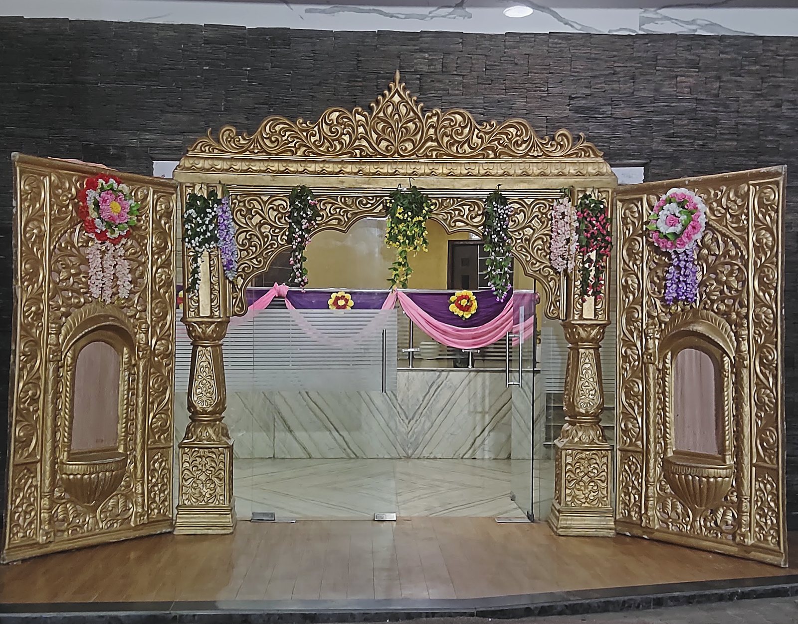 Banquet hall stage dressed for a wedding